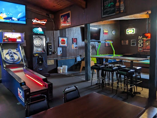 Skeeball, darts, and arcade games inside Savage Moose